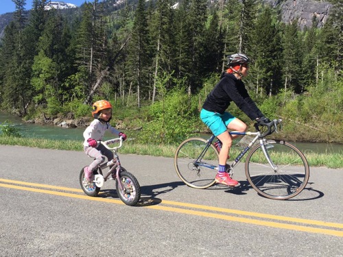 mother and daughter biking in Glacier National Park