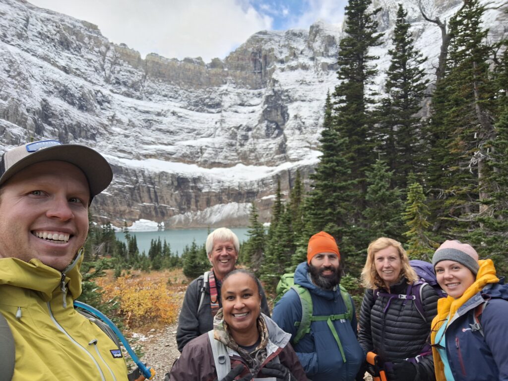Guide Tom Matelich with guests at Iceberg Lake. 10 reasons to explore glacier with a guide