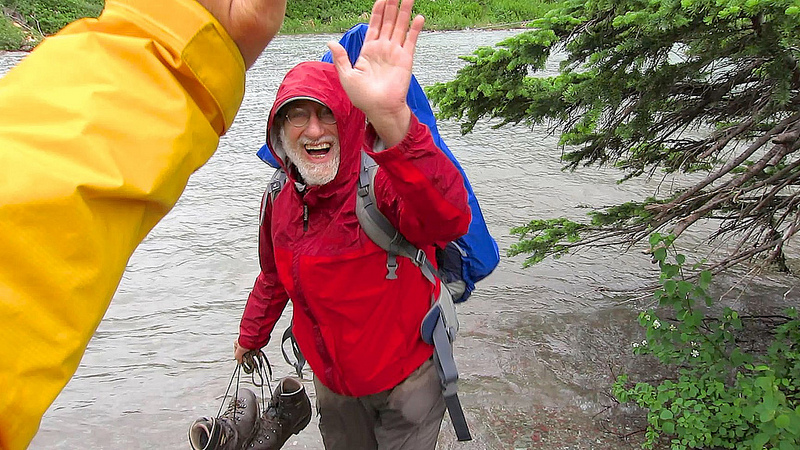 High fiving a guest after a water crossing. Photo by Jeff Compton