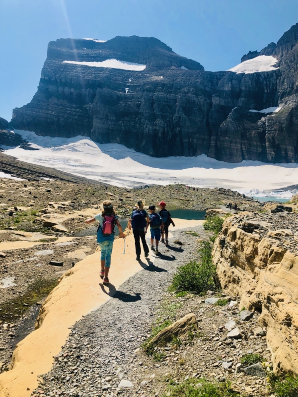 kids hiking to Grinnell Glacier