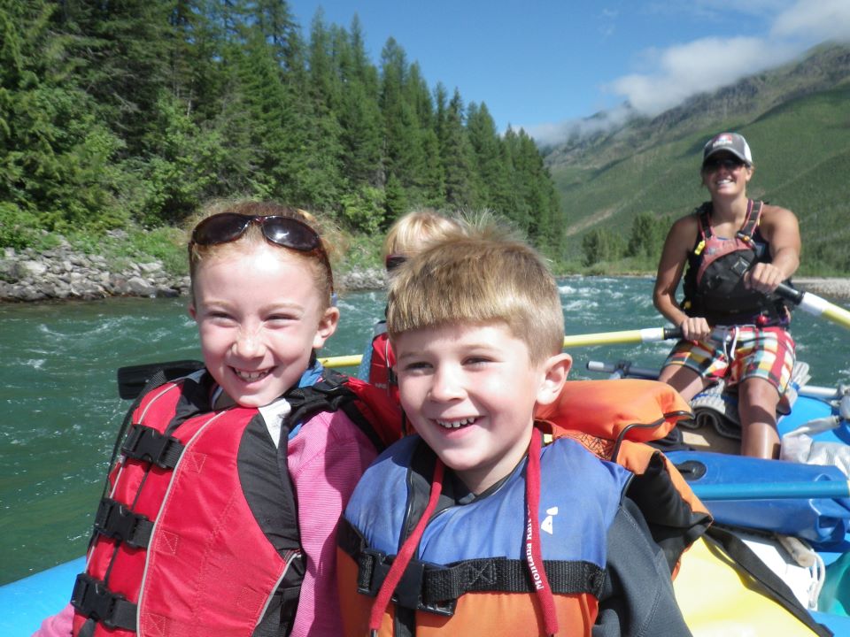 We are thankful for Glacier National Park and kids having a blast whitewater rafting on the Middle Fork of the Flathead River near Glacier National Park, Montana.